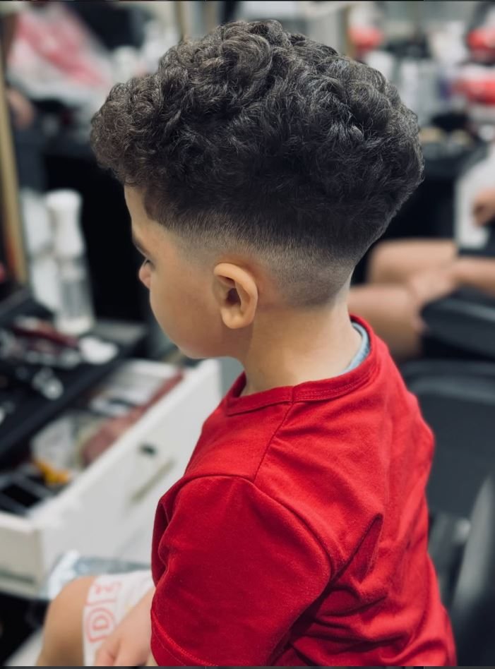 A child having his hair cut