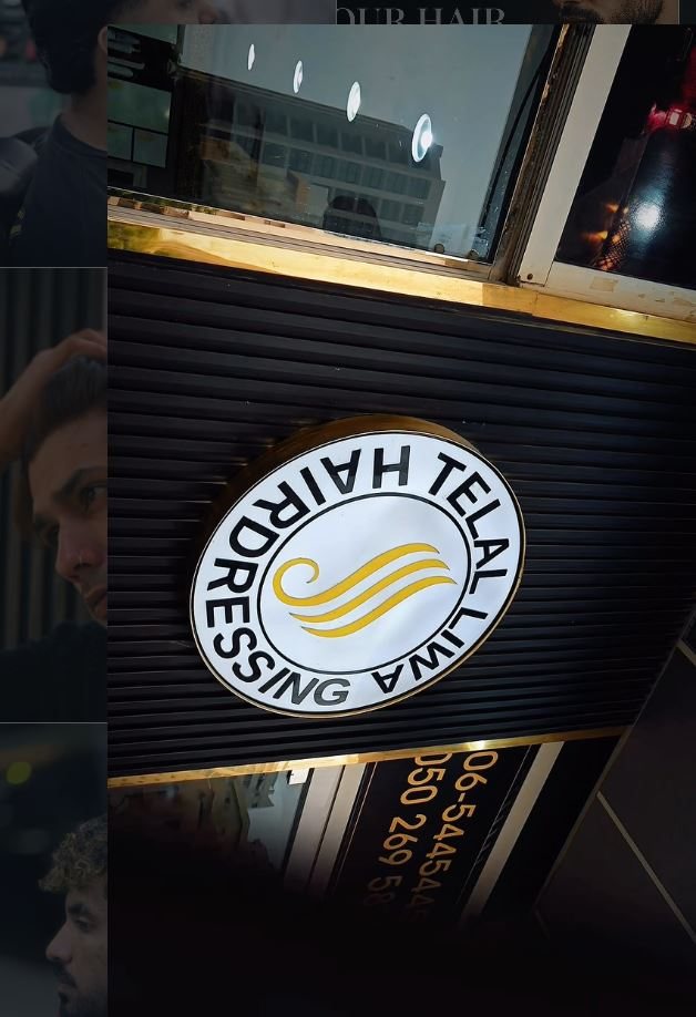 The Telal Liwa Hairdressing sign outside the salon